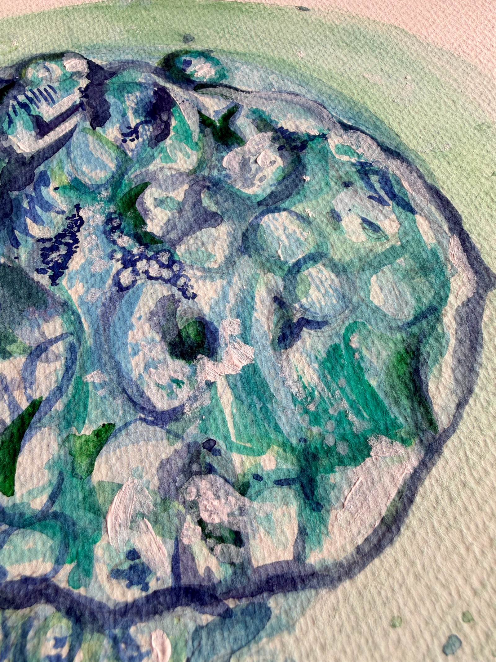 A scan being painted by hand in watercolour
