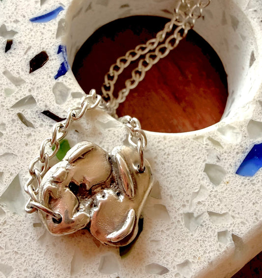 silver ultrasound pendant