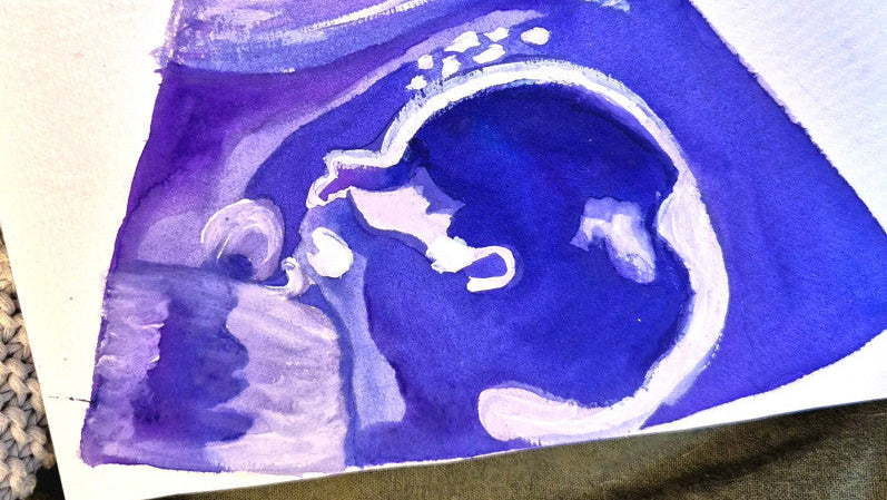 A scan being painted by hand in watercolour
